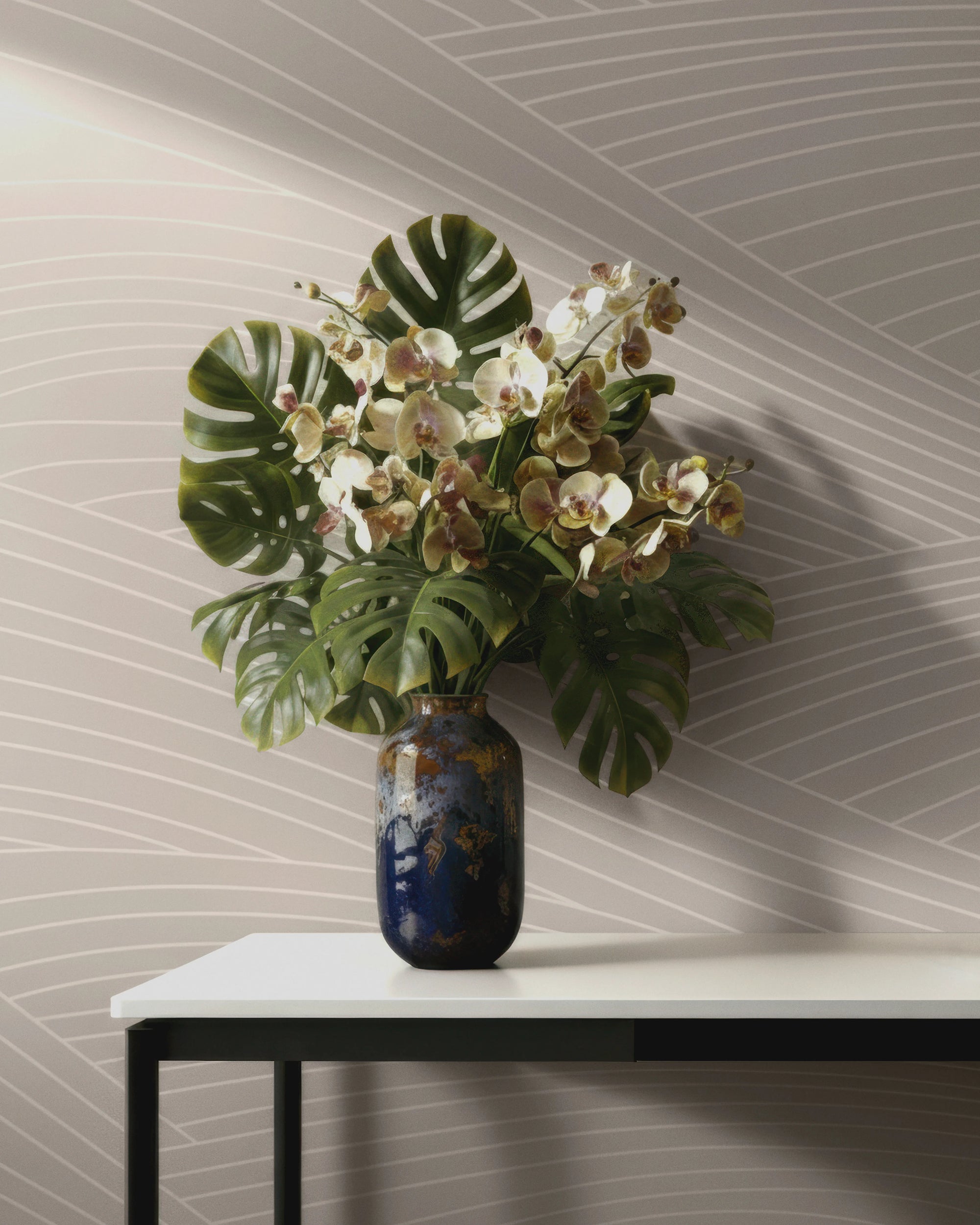 Vase with flowers on a table against a patterned wallpaper by Buffalo Bunny.