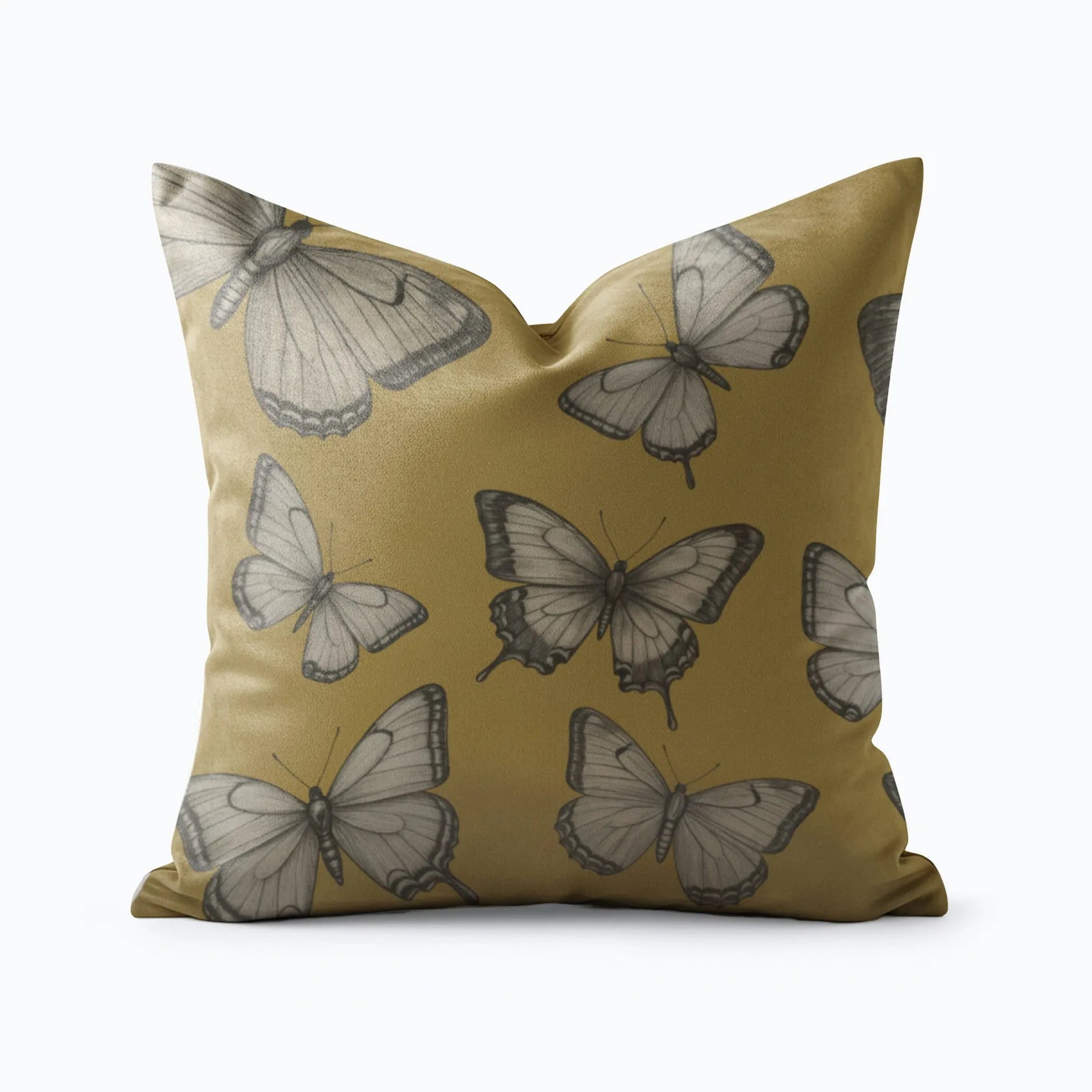 Mustard yellow throw pillow with black and white butterfly.