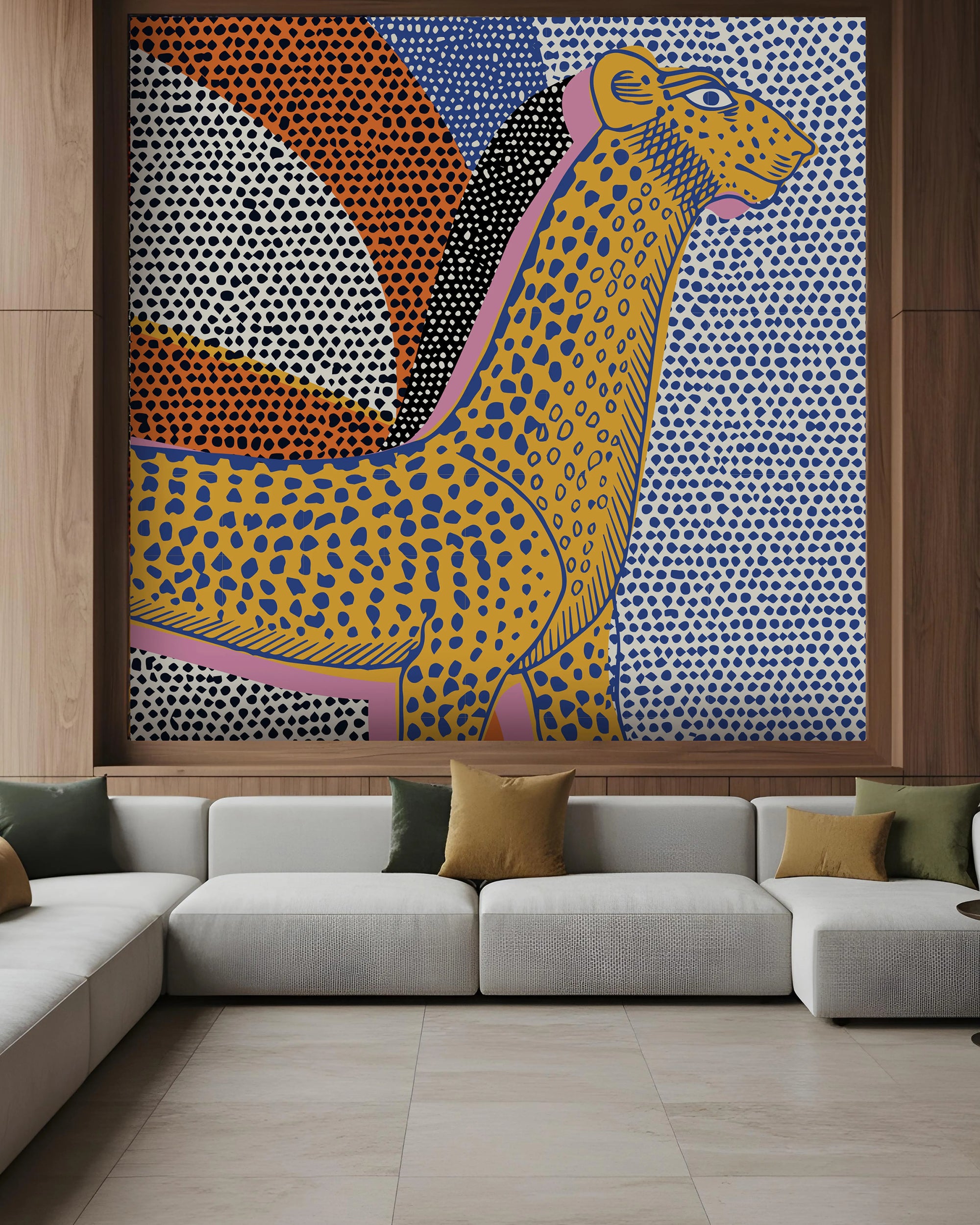 Colorful abstract tapestry with a stylized animal design hanging above a modern sofa by Buffalo Bunny.