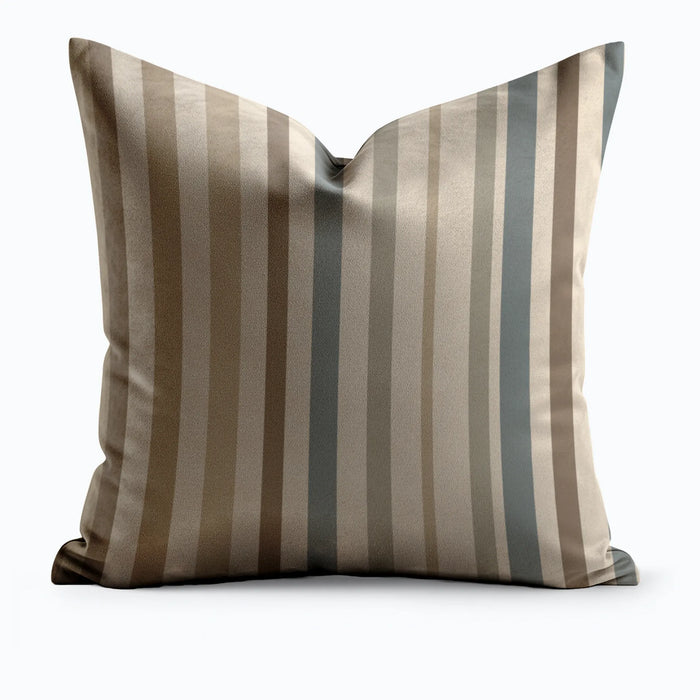 Striped pillow with brown and gray vertical stripes on a white background by Buffalo Bunny.