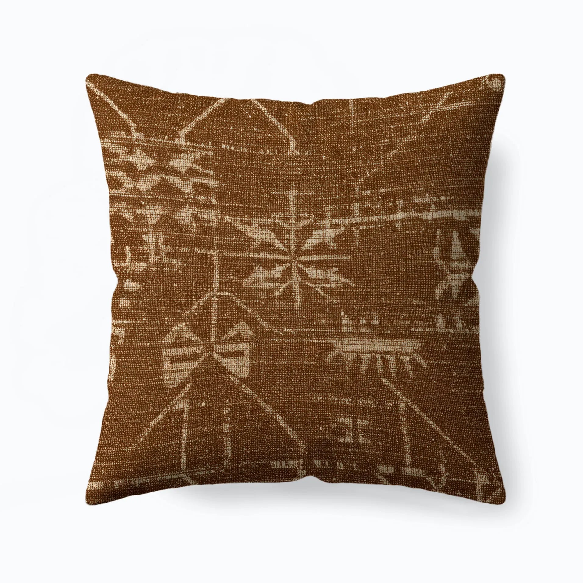 Brown throw pillow with subtle beige tribal-inspired geometric pattern on textured woven fabric.