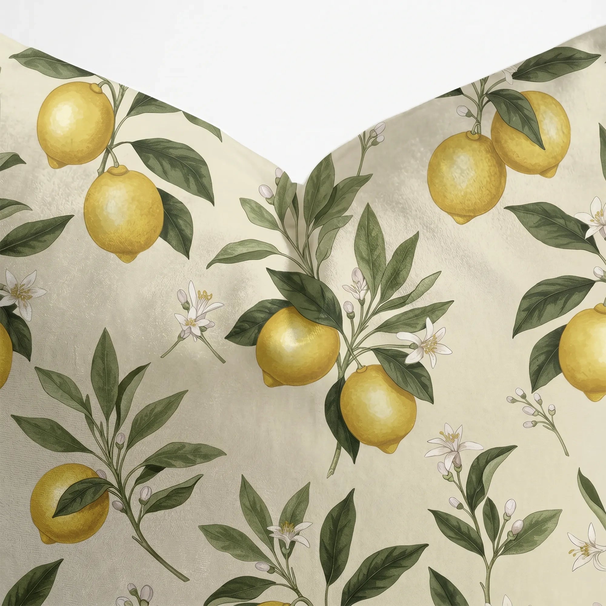 Lemon Grove Blossom pillow corner detail showing large lemons, green leaves, and white blossoms