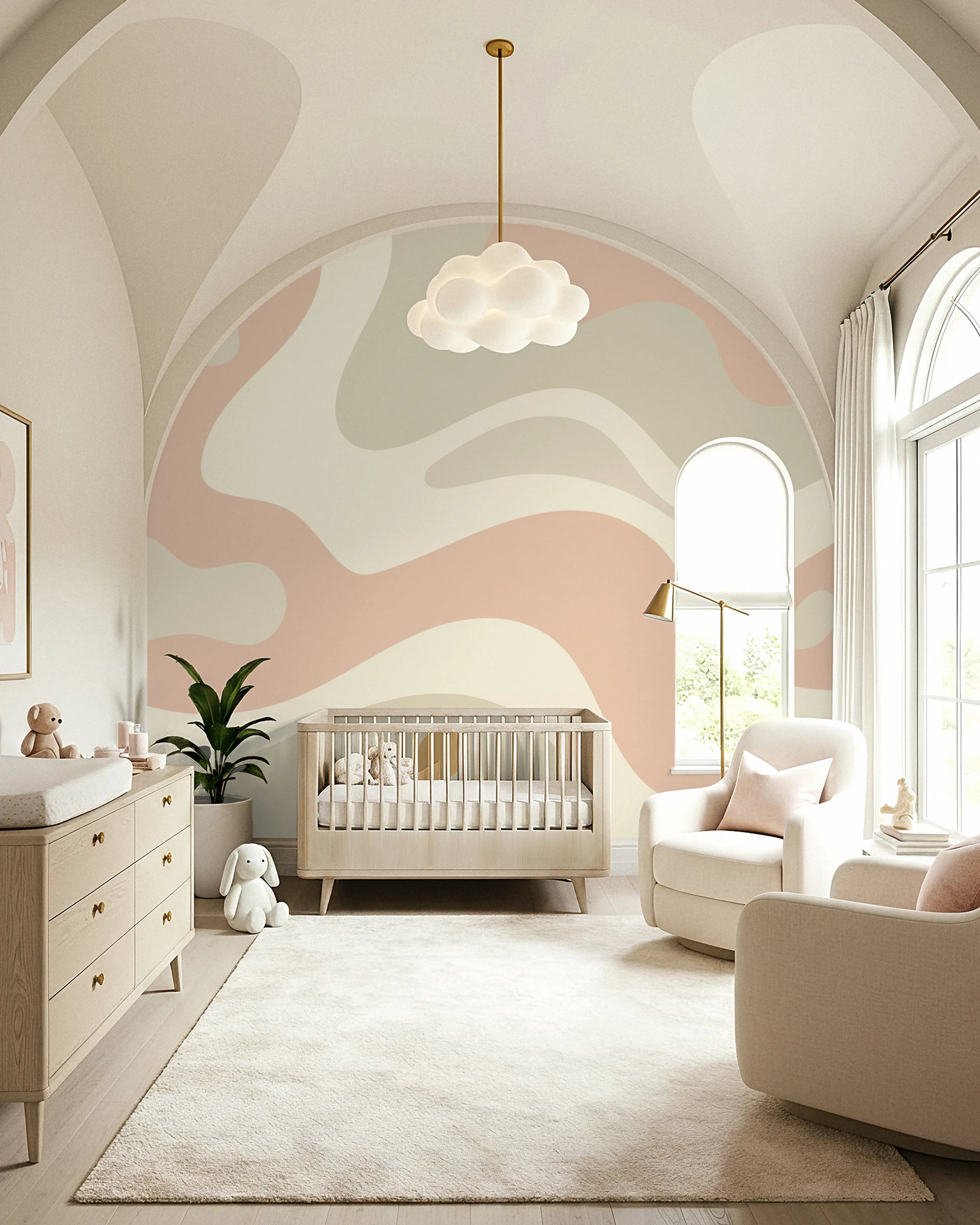 Modern nursery with pink and gray abstract wall design, Buffalo Bunny wallpaper, crib, and white furniture.