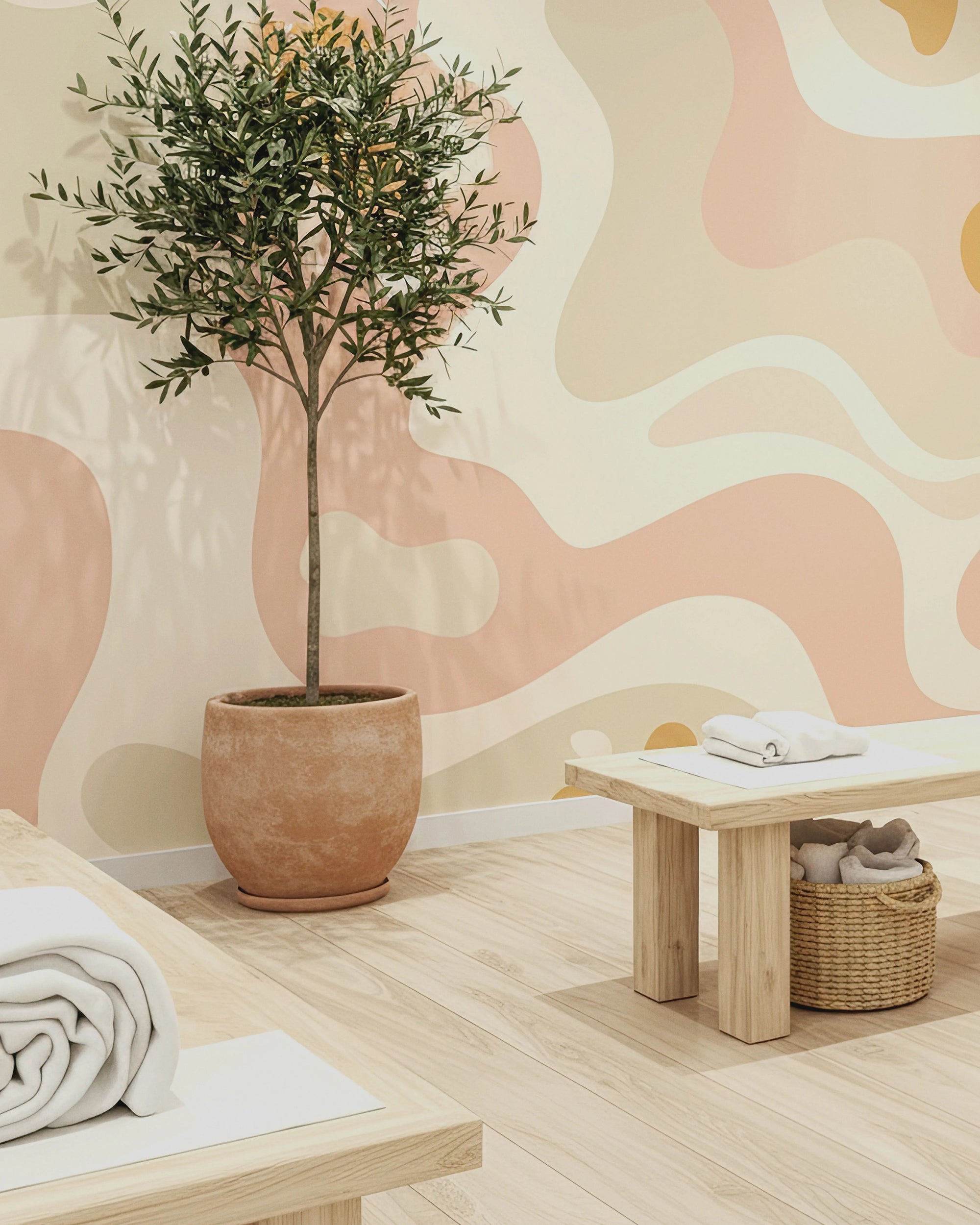 Room with a potted plant, wooden bench, and abstract wall art by Buffalo Bunny.