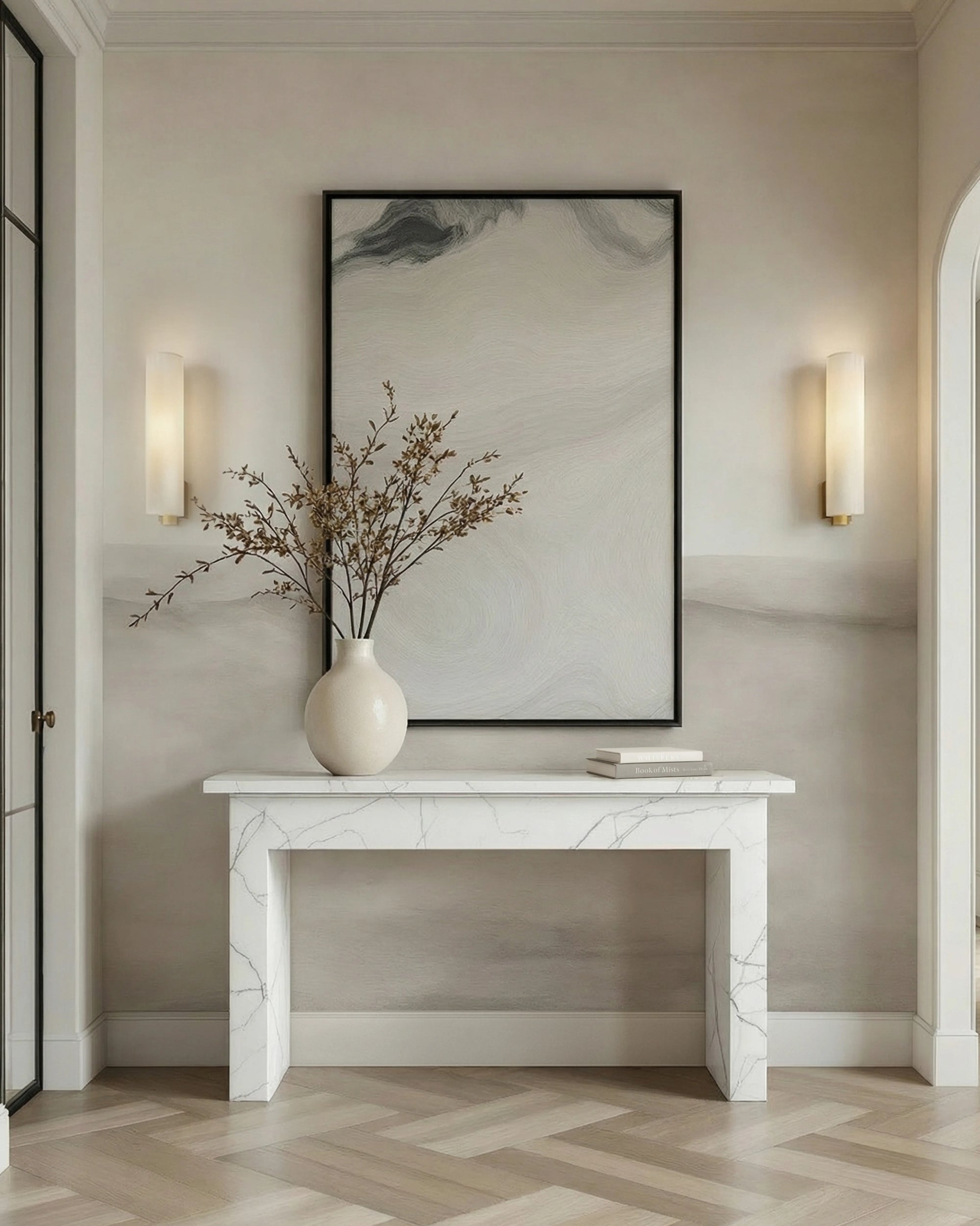 Decorative interior with a marble console table, vase with branches, and framed artwork. Grey and beige ombre gradient wallpaper.