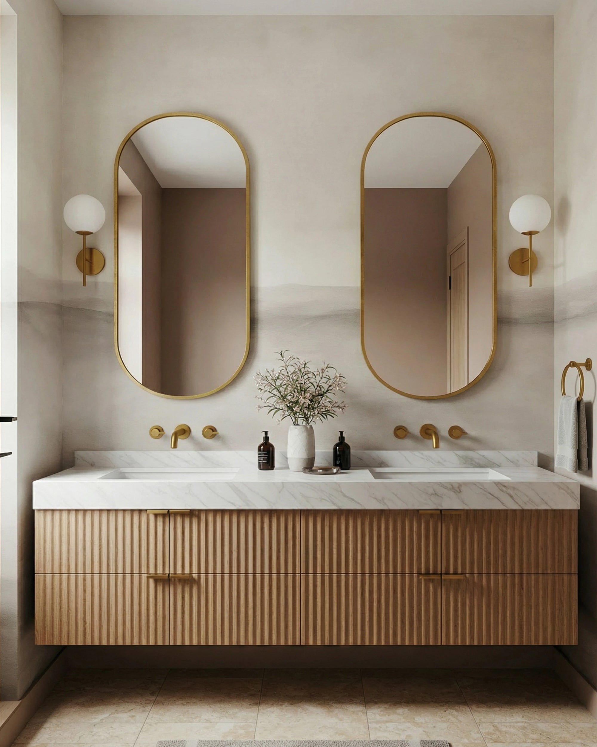 Bathroom vanity with double sink, mirrors, and decorative elements. Grey and beige ombre gradient wallpaper.
