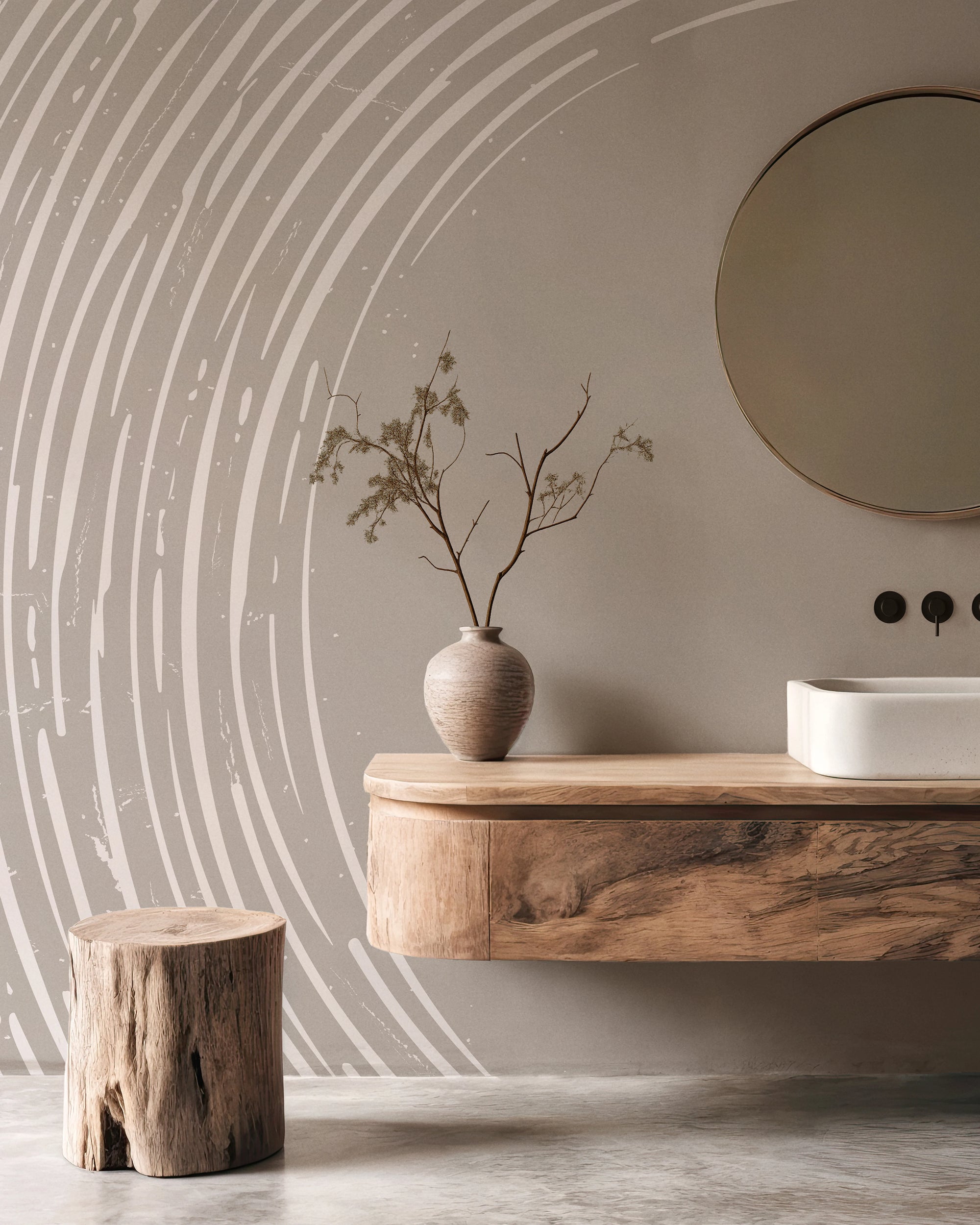 Bathroom with wooden vanity, round mirror, decorative vase, and a wall mural by Buffalo Bunny.