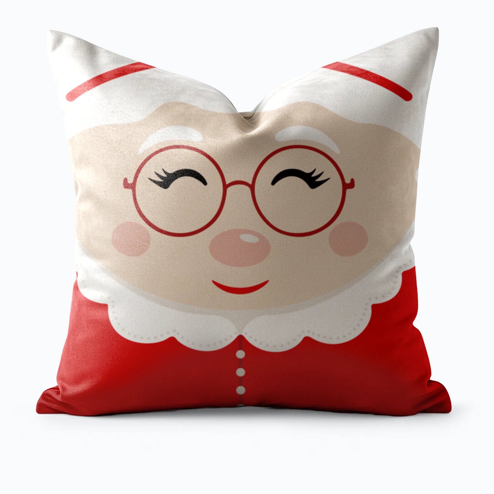 Pillow with a Mrs. Claus face design by Buffalo Bunny.