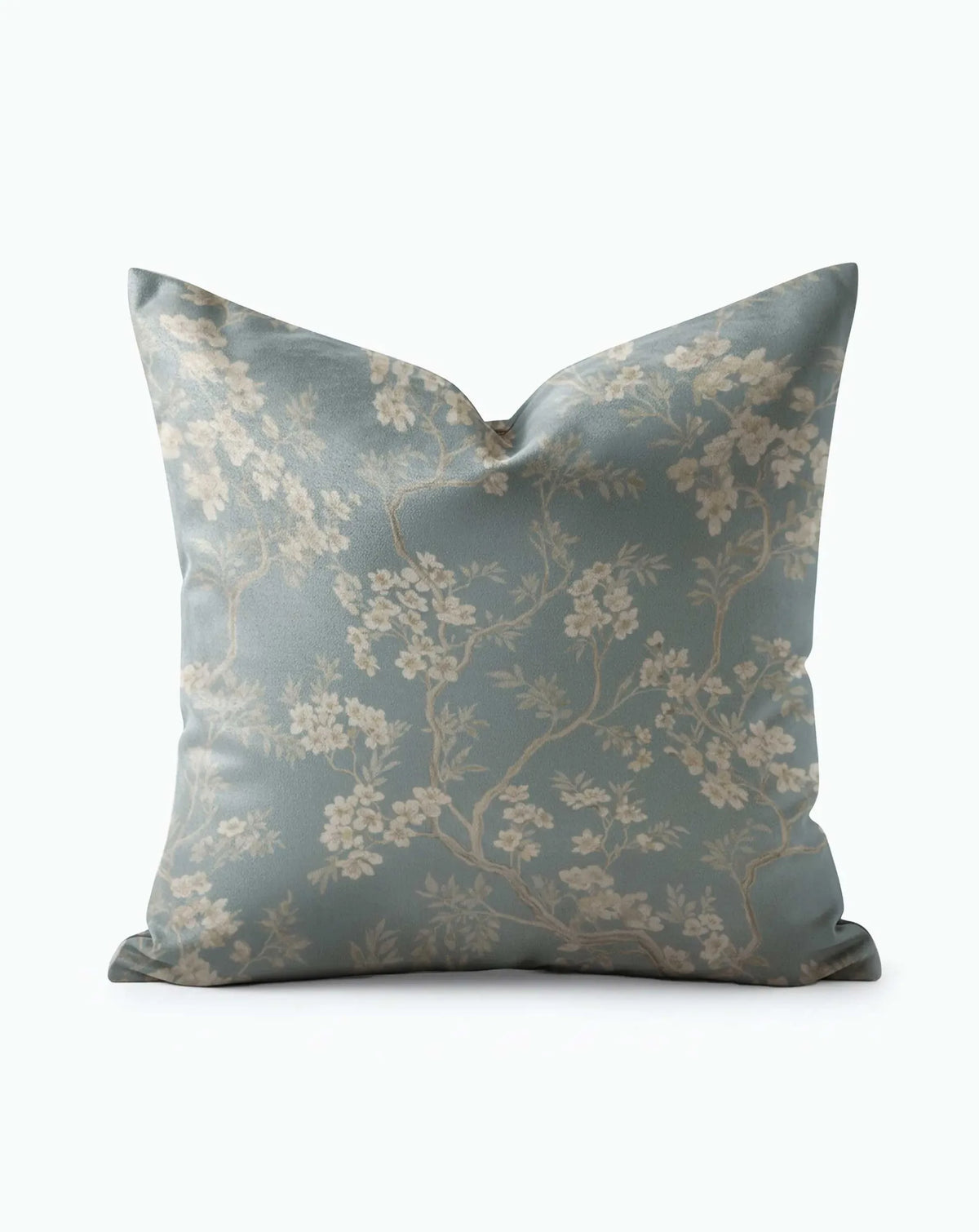 Chinoiserie Floral Throw Pillow with cream cherry blossoms and tan branches on soft sage blue