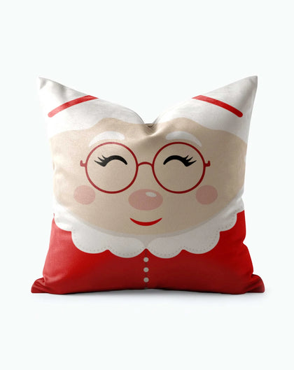 Mrs. Claus Festive Christmas Throw Pillow with smiling face, round red glasses, rosy cheeks, and red suit
